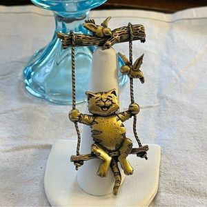 Vintage JJ cat on a swing brooch